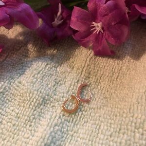 3 pr. of pierced earrings for $25. Gold earrings